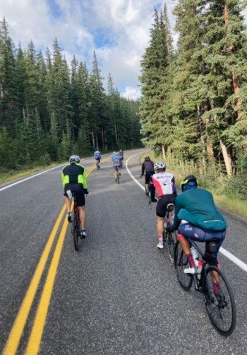 ResFrac riders climbing a mountain on bikes