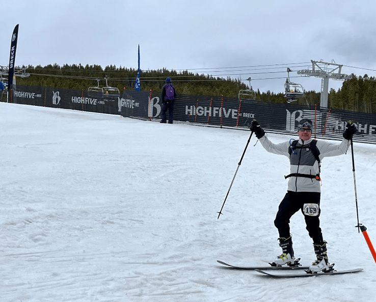 Dirk McDermott triumphantly finishes the race